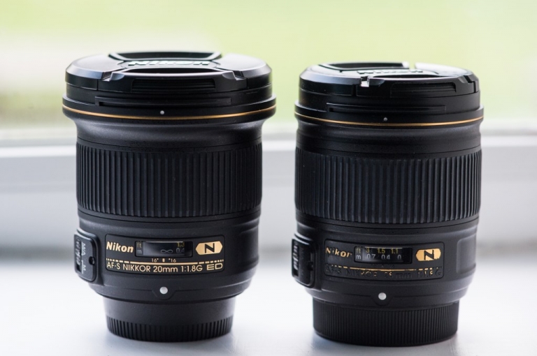 The new Nikon 20mm 1.8 next to it's well-loved brother, the nikon 28mm 1.8. Despite my abuse, the 28mm is still a good lens. 