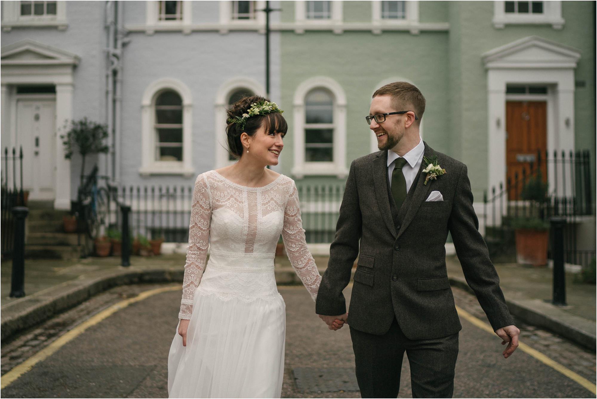 bride and groom walking in chelsea london