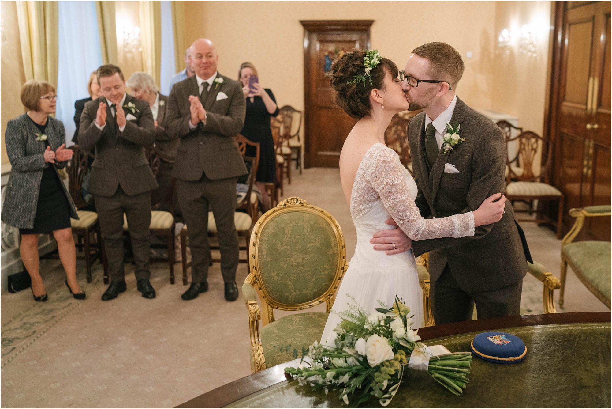 first kiss at wedding ceremony at chelsea old town hall