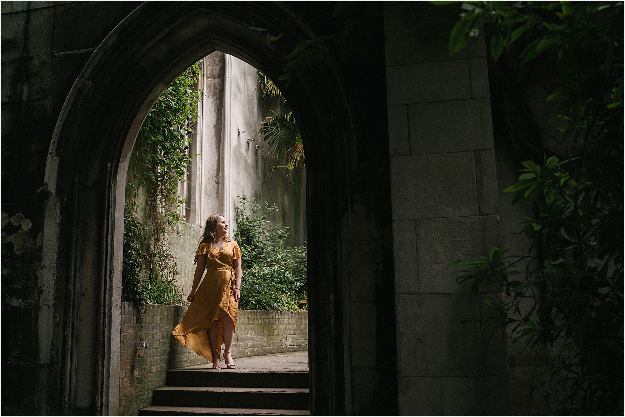A senior portrait session in St. Dunstan in the East Church Garden, London, England.  