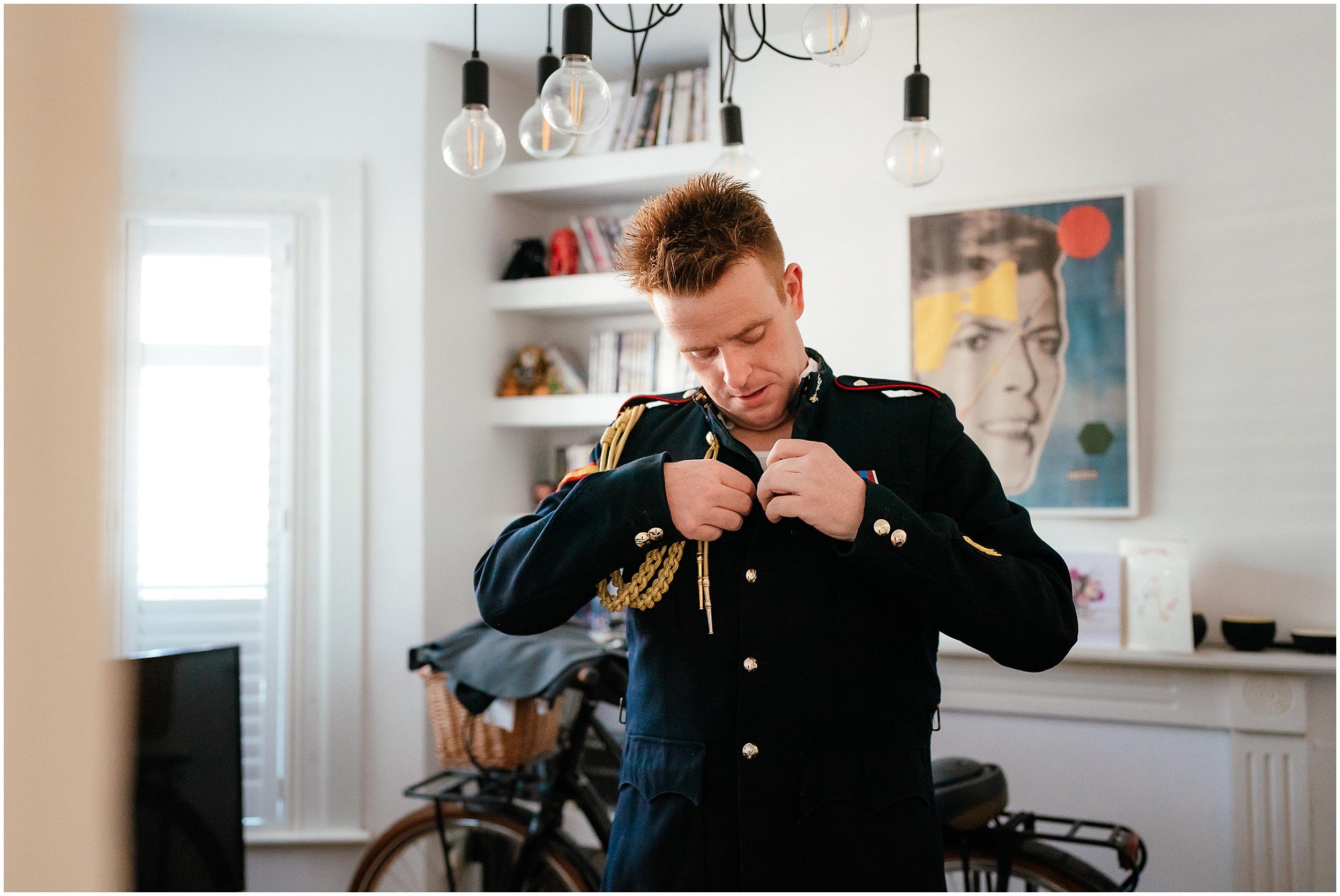 A groom getting ready for his wedding. 