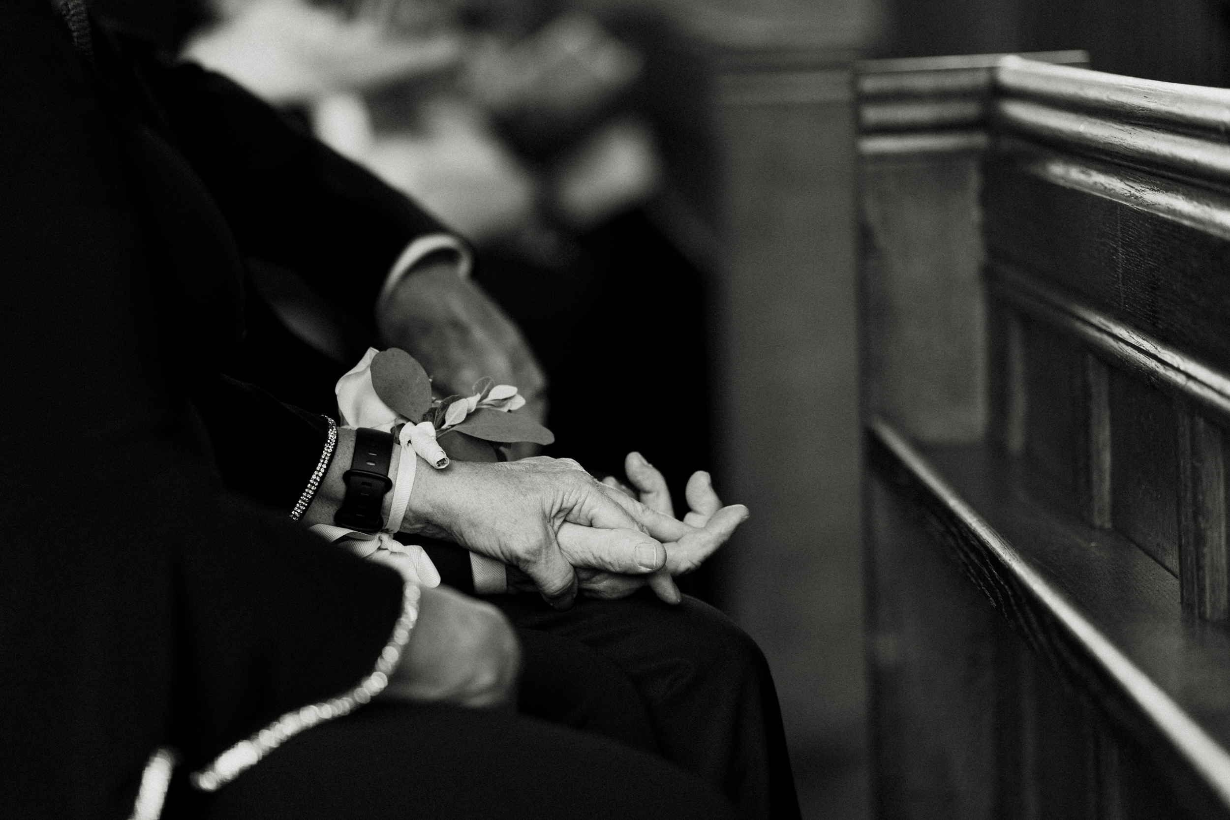 A intimate moment during a wedding ceremony at St Etheldreda's Church in London. 