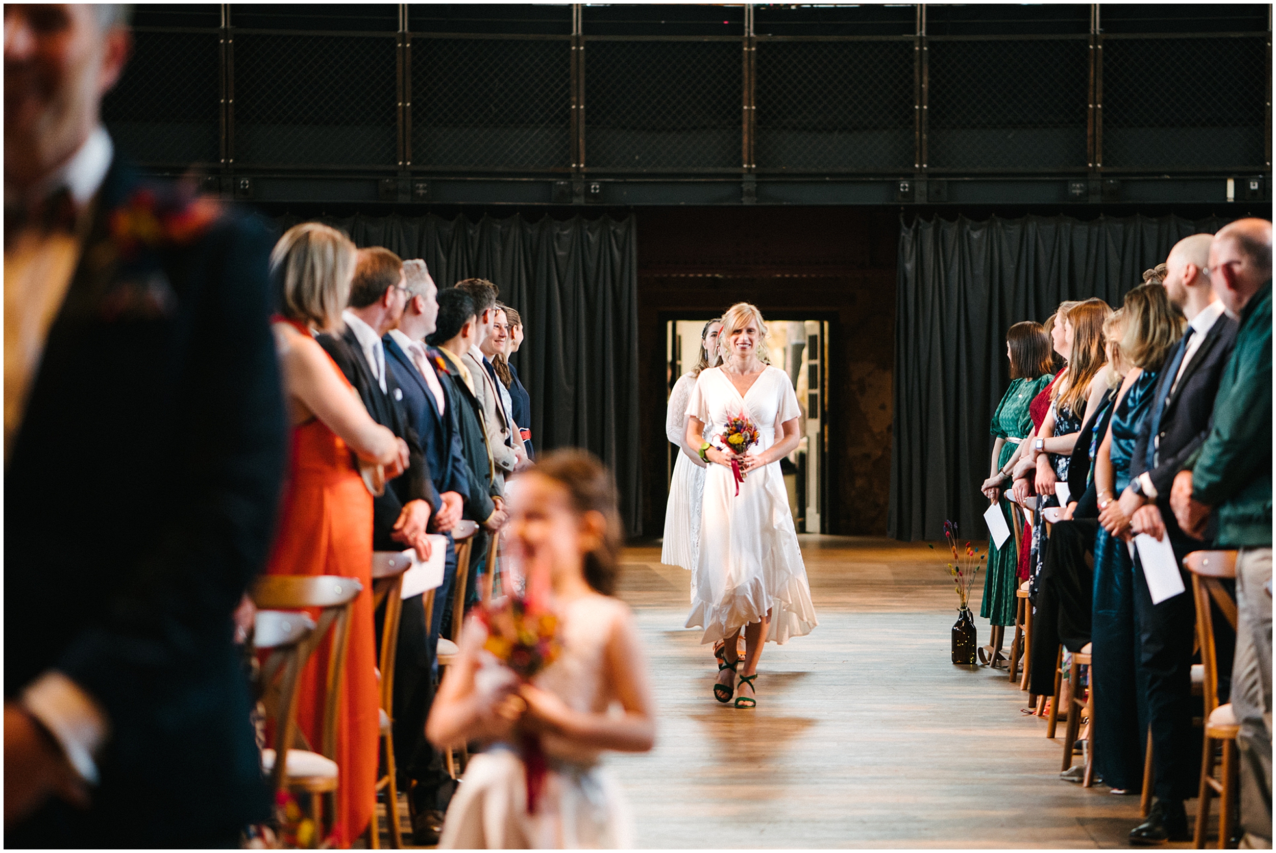 wedding party walks down the aisle at Battersea Arts Centre 
