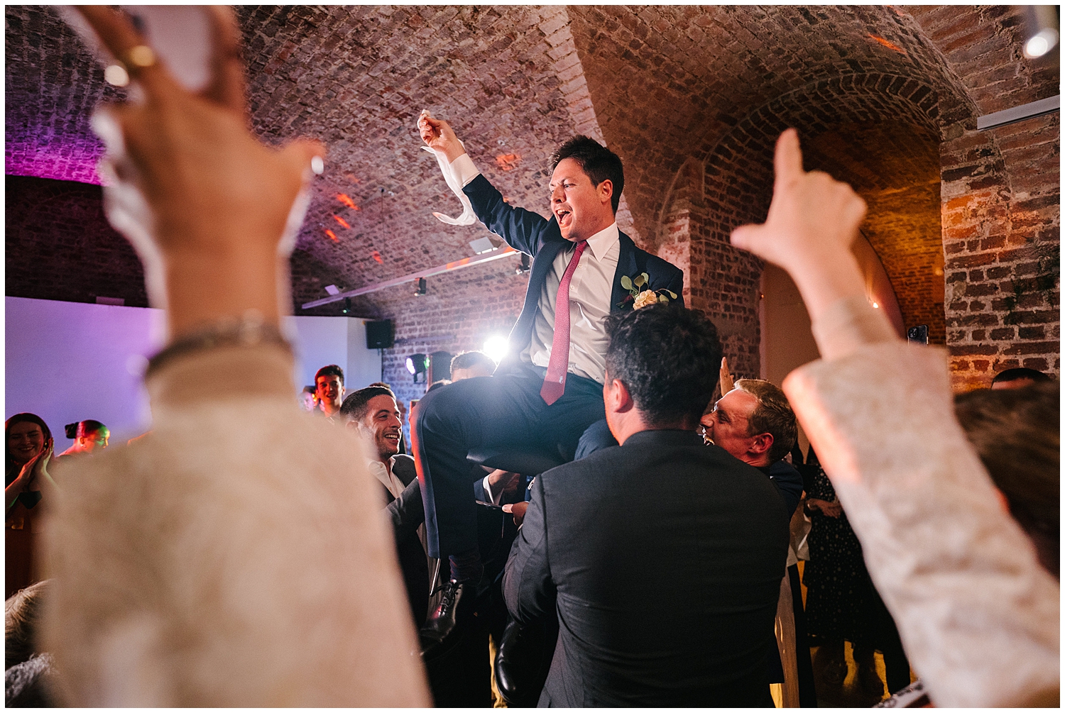 A groom dancing at the Royal Society of the Arts. Photographed by Kari Bellamy based in Yorkshire. 