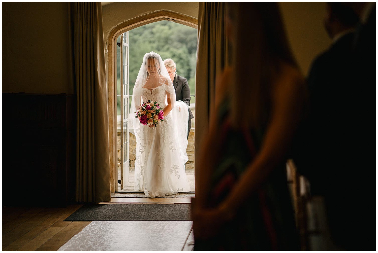 A bride about to walk down the aisle at Leeds Castle in Kent. Photographed by Kari Bellamy based in Yorkshire. 