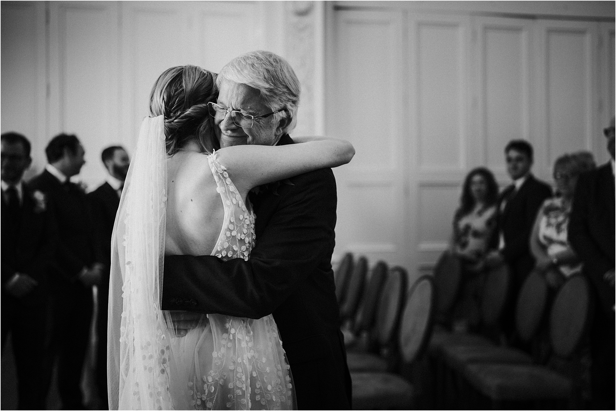 A dad giving his daughter a hug during the wedding ceremony at the Trafalgar Tavern Greenwich, London.