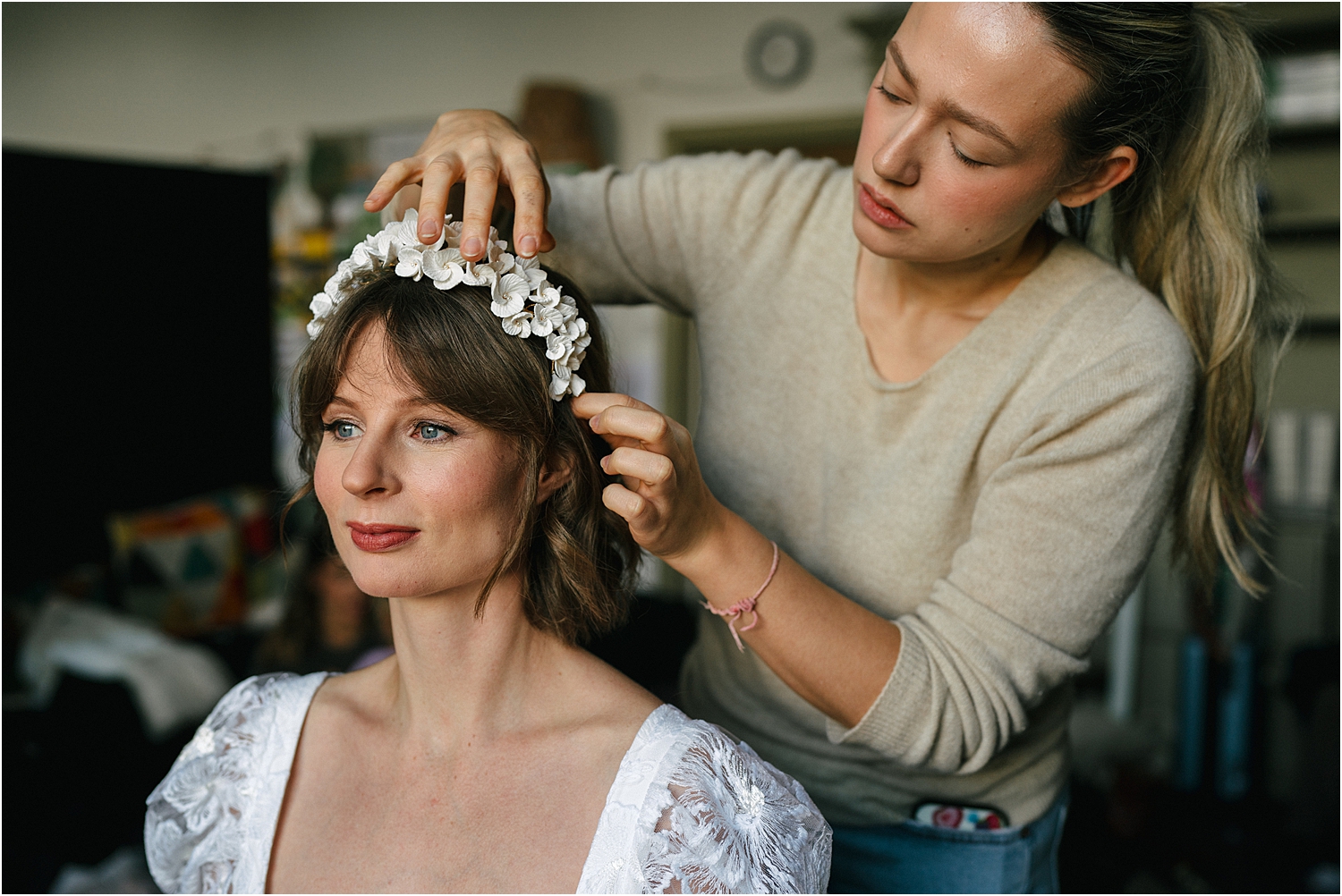 A bride getting ready at Hampton Court House. 