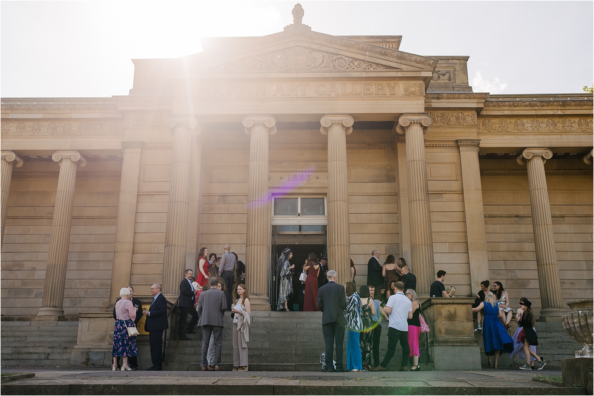 Wedding guests outside of Weston Park Museum in Sheffield, South Yorkshire. 